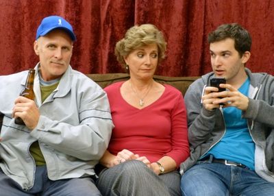 Becky wants romance while her husband just wants a beer and her son wants to text. (B Photo