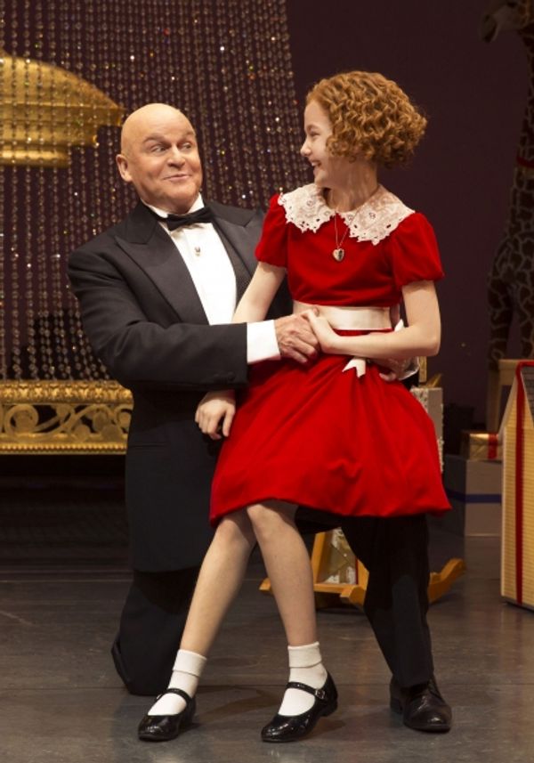 Ron Raines as Daddy Warbucks and Taylor Richardson as Annie Photo