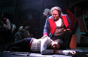 Mike Longo as Marius and John Anthony Lopez as Jean Valjean Photo