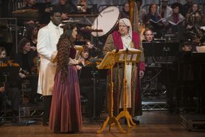 Arya Daire as Bell and Michael Lindner as Scrooge Photo