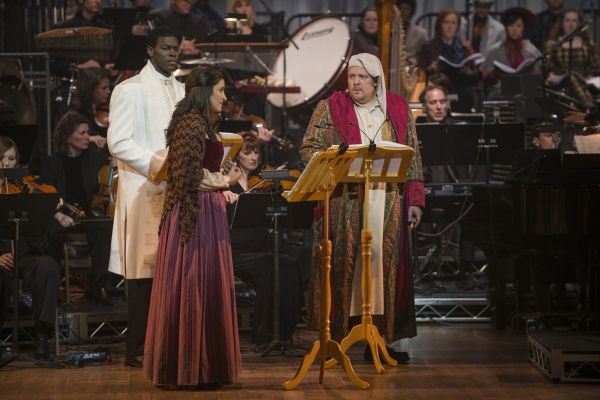 Arya Daire as Bell and Michael Lindner as Scrooge Photo