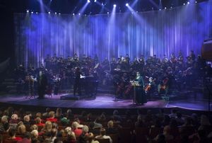 Michael Lindner as Scrooge, E Faye Butler as The Narrator Photo