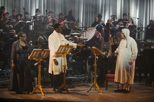E Faye Butler as The Narrator, Kyle Scatliffe as the Ghost of Christmas Past and Mich Photo