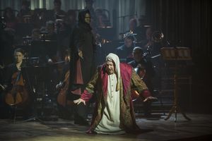 Michael Lindner as Scrooge and Kyle Scatliffe as the Ghost of Christmas Future Photo