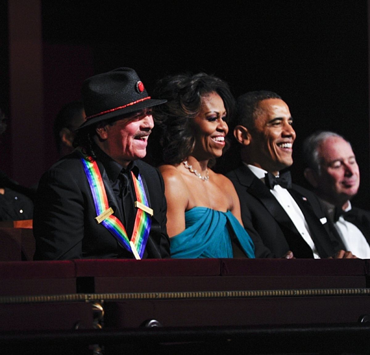 Musician and songwriter Carlos Santana, President and Mrs. Obama at 