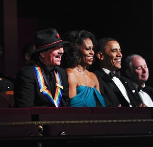 Musician and songwriter Carlos Santana, President and Mrs. Obama Photo