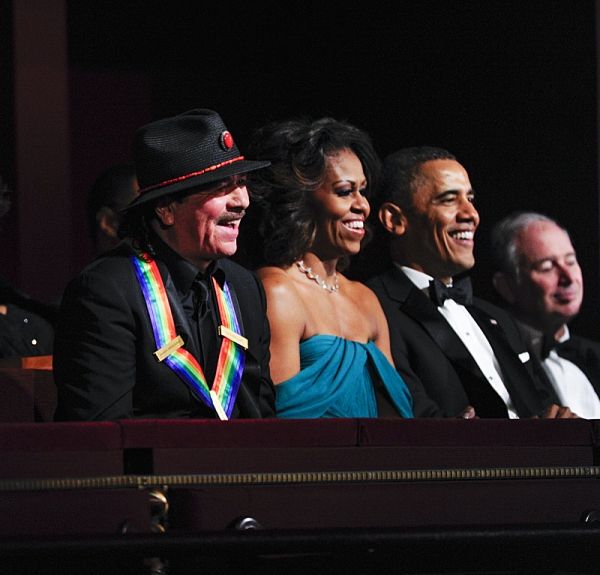 Musician and songwriter Carlos Santana, President and Mrs. Obama Photo