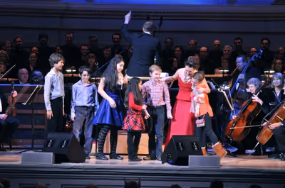 Ashley Brown, Steven Reineke and children from the audience Photo