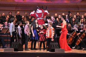Santa Claus conducting The New York Pops with Steven Reineke and Ashley Brown @ BroadwayWorld Santa Claus conducting The New York Pops with Steven Reineke and Ashley Brown Photo