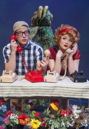 Seymour (Adam Cotugno) and Audrey (Adrienne  Walters) find their plant shop is sudden Photo