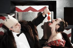 The gluttonous Mother (Ponder Goddard) and Father Ubu (David Sinako) over-indulge in  Photo