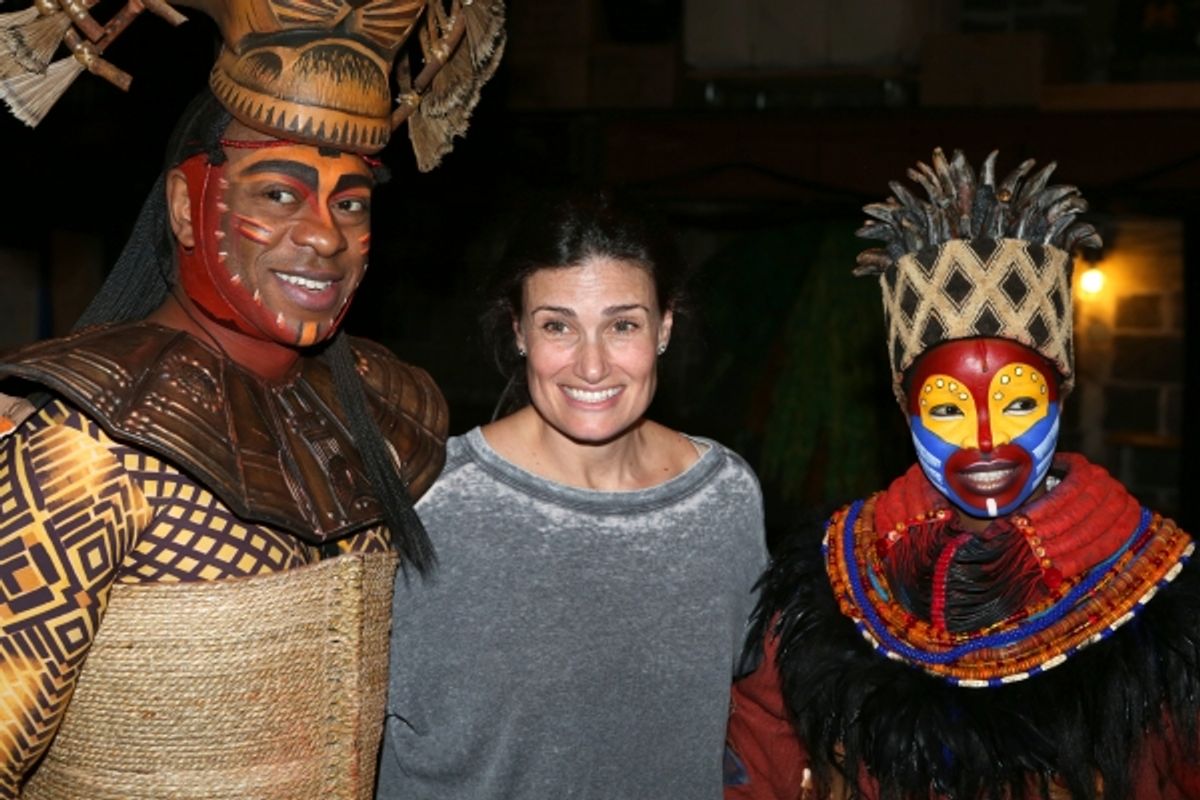 Alton Fitzgerald White as ''Mufasa'', Idina Menzel and Mukelisiwe Goba as ''Rafiki'' pose backstage after a performance of ''The Lion King'' at the Minskoff Theatre on January 12, 20114 in New York City. at 