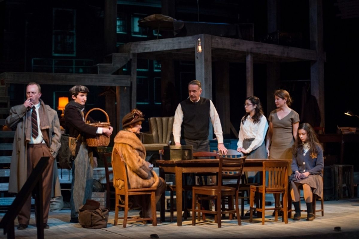 Scott Langdon as Mr. Van Daan, Owen Manion as Peter, Anne Connors as Mrs. Van Daan, Paul Dake as Mr. Frank, Dana Gitlin as Margot, Margaret DeAngelis as Mrs. Frank, and Anastasia Korbal as Anne Frank at 