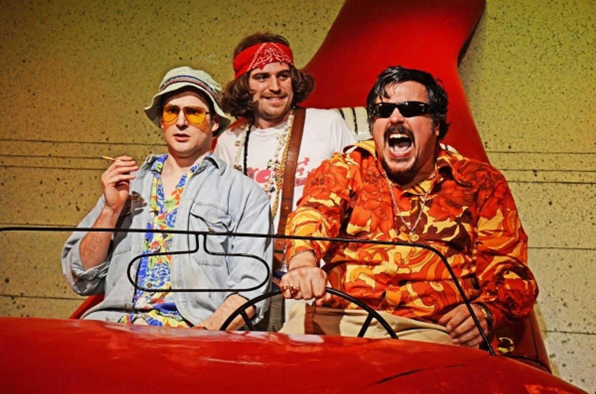 Ed Hughes (Raoul Duke), Tom Moores (Ensemble) and Rob Crouch (Dr Gonzo) in Fear and Loathing in Las Vegas. Photo by Nobby Clarke. at 