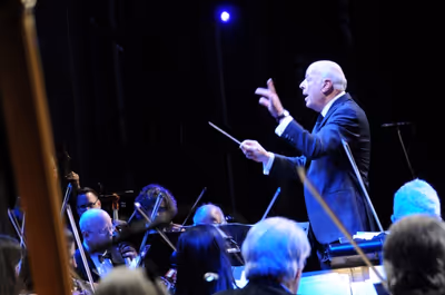 Grammy and Emmy Award winning composer Charles Fox directing the LA Lawyers Philharmo Photo