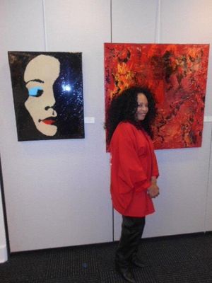 Tina Andrews in front of her work @ BroadwayWorld Tina Andrews in front of her work Photo