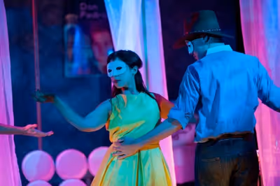 Hero (Charlotte Pines) and Don Pedro ( Eric Fletcher) enjoy the masquerade
 Photo