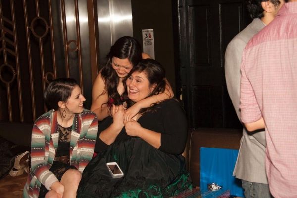 Jessica Apperson and Jordan Michelle DeLeon congratulate Daniella Painton as they ann Photo