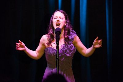 Contestant and finalist, Kimberly Hessler, sings He Touched Me Photo