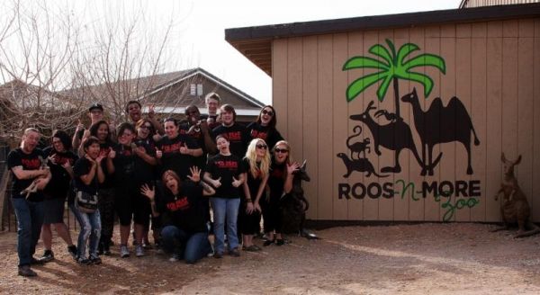 Sirc Michaels and the cast and crew of EVIL DEAD pose with Ashley J. Wallaby and some Photo