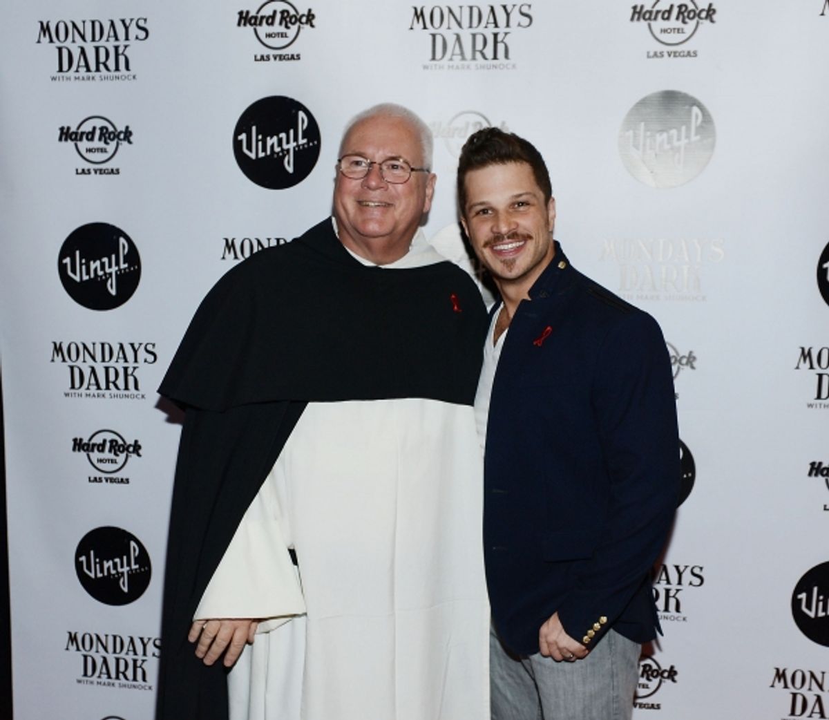 Father Joseph O'Brien (Executive Director of St. Therese Center) and Mondays Dark creator and Rock of Ages star, Mark Shunock at 