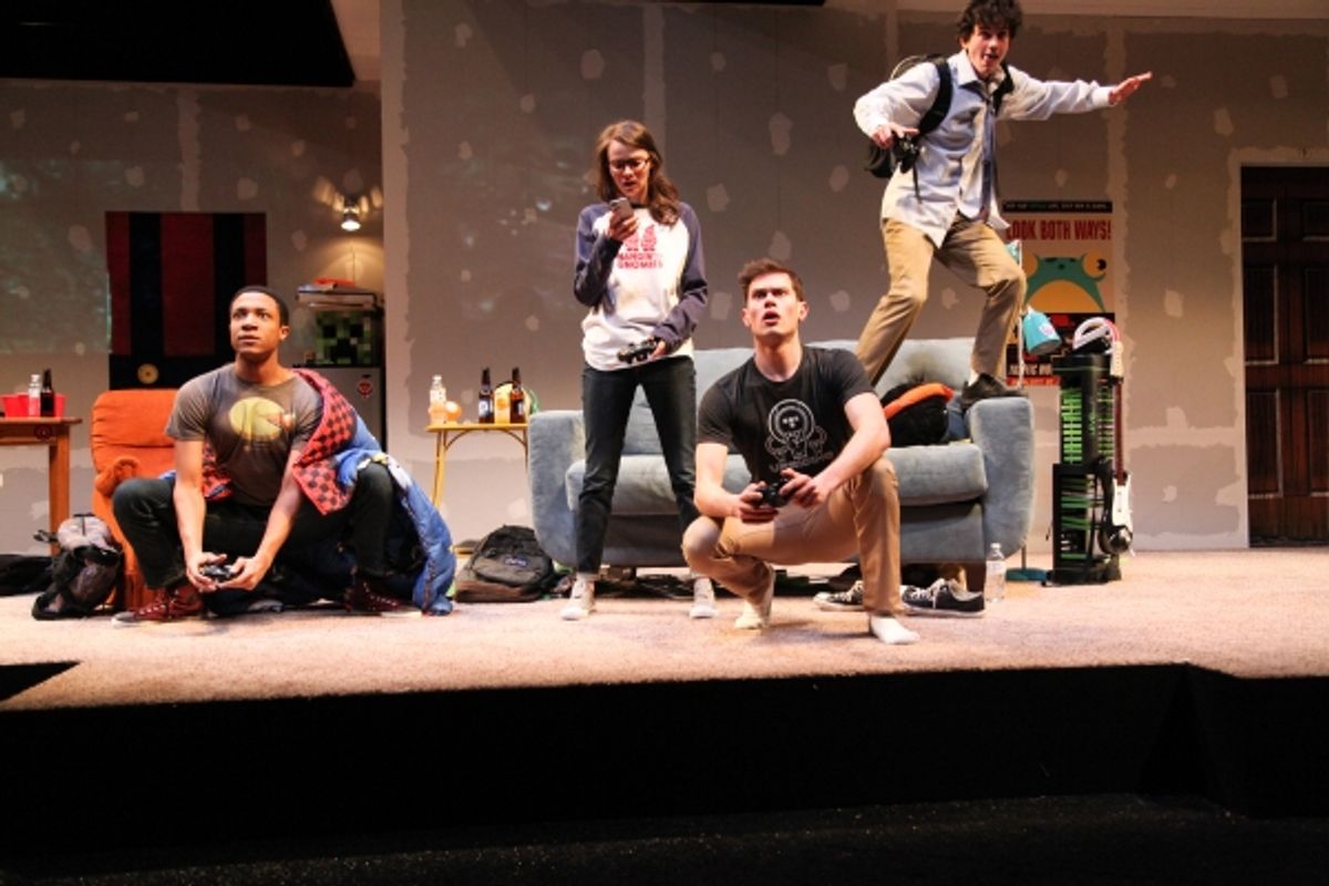 Chuck (Jerry MacKinnon), Jeannie (Carolyn Braver), Zander (JJ Phillips) and Ian (Clancy McCartney) playing video games  at 