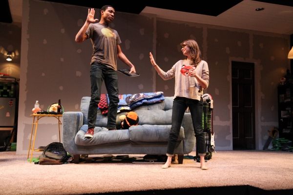 Chuck (Jerry MacKinnon) gives Jeannie (Carolyn Braver) a high-five after a great game Photo