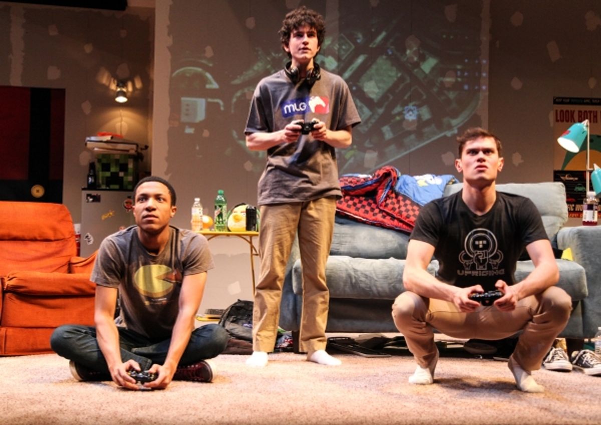Chuck (Jerry MacKinnon), Ian (Clancy McCartney) and Zander (JJ Phillips) play a game together at 