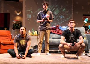 Chuck (Jerry MacKinnon), Ian (Clancy McCartney) and Zander (JJ Phillips) play a game together @ BroadwayWorld Chuck (Jerry MacKinnon), Ian (Clancy McCartney) and Zander (JJ Phillips) play a game Photo