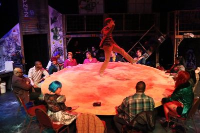 Jeremy Hyatt (as Mark, center) and the cast perform ''La Vie Boheme'' Photo