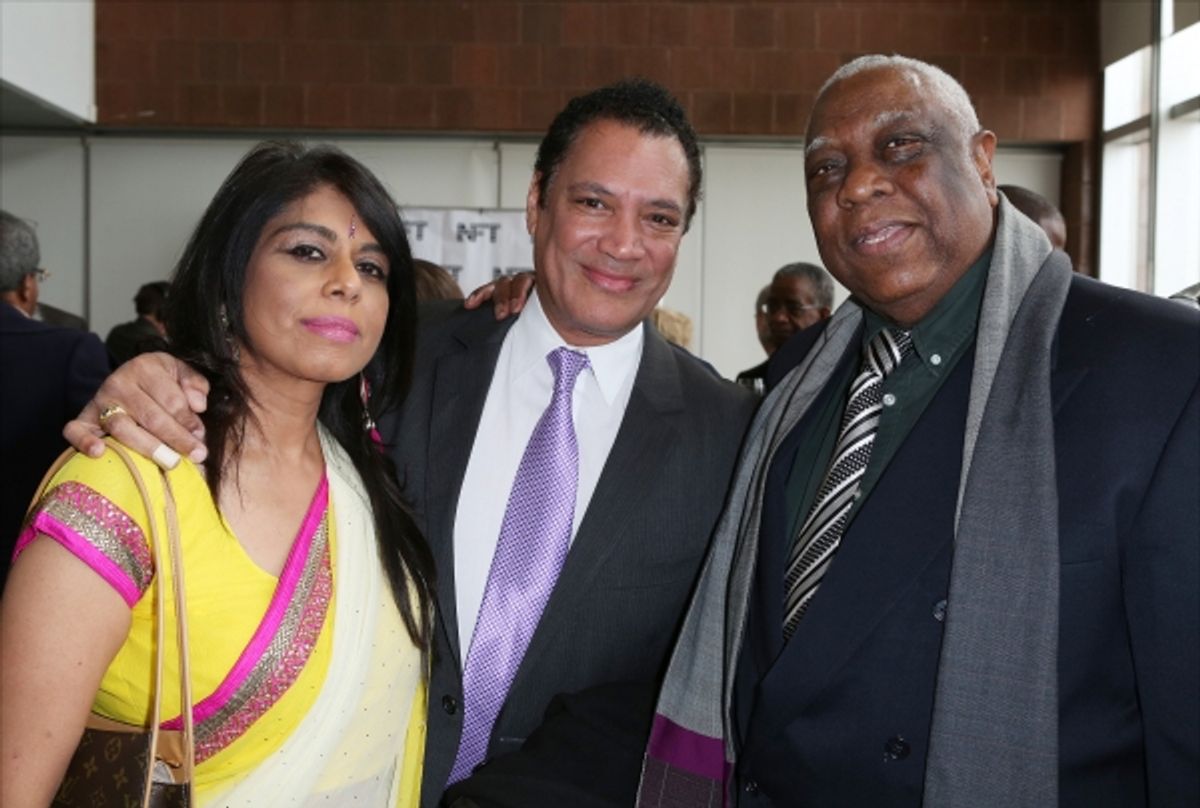 Ricardo Khan and fiancee with Woodie King Jr.  at 