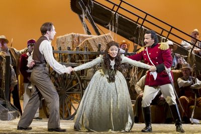 Stephen Costello as Nemorino, Ailyn Perez as Adina, and Simone Alberghini as Sergeant Photo