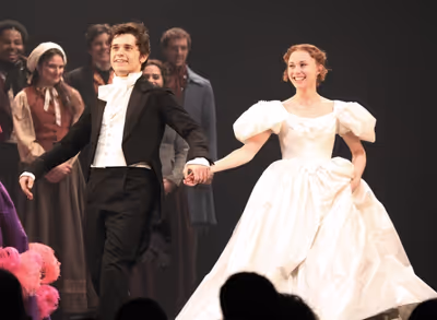 Andy Mientus and Samantha Hill with company Photo