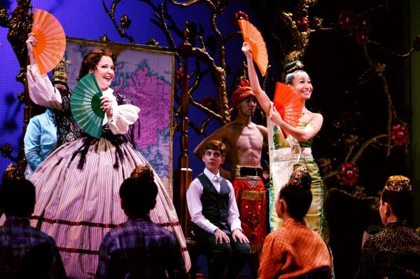 Michele Ragusa (as British schoolteacher Anna Leonowens), left, dances with Rumi Oyam Photo