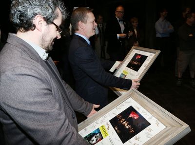Director Laurence Connor and Director James Powell presented with gifts from the Comp Photo