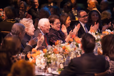 President Jimmy Carter and director Molly Smith enjoy the seated dinner Photo