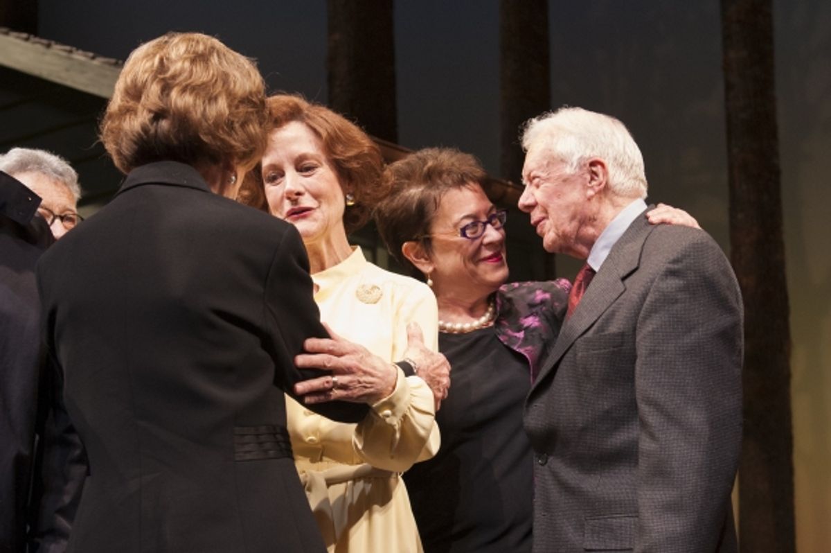 President Jimmy Carter and Rosalynn Carter greet cast member Hallie Foote (as Rosalynn Carter) and director Molly Smith during the opening night curtain call at 