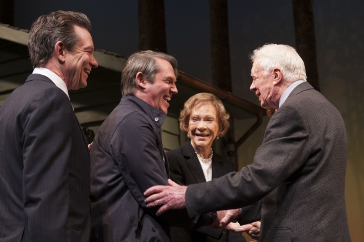 Playwright Lawrence Wright and cast member Richard Thomas (as Jimmy Carter) are greeted by Rosalynn Carter and President Jimmy Carter following the opening night curtain call  at 