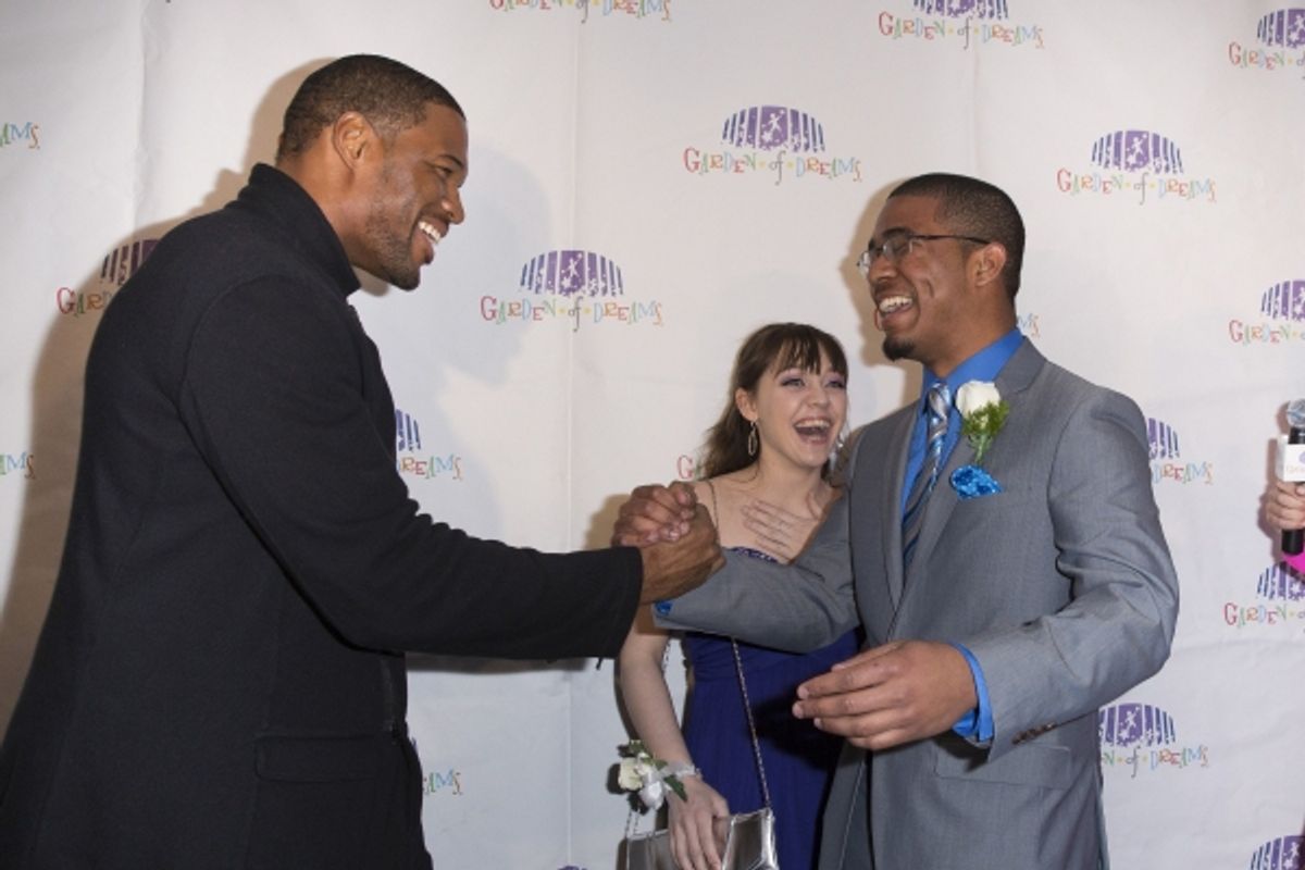 Jeremy Brown, Brittany DeLuca, Michael Strahan. Credit: MSG Photos at 