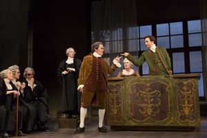 Derek Smith (center), Adam Green (right) and members of the company Photo