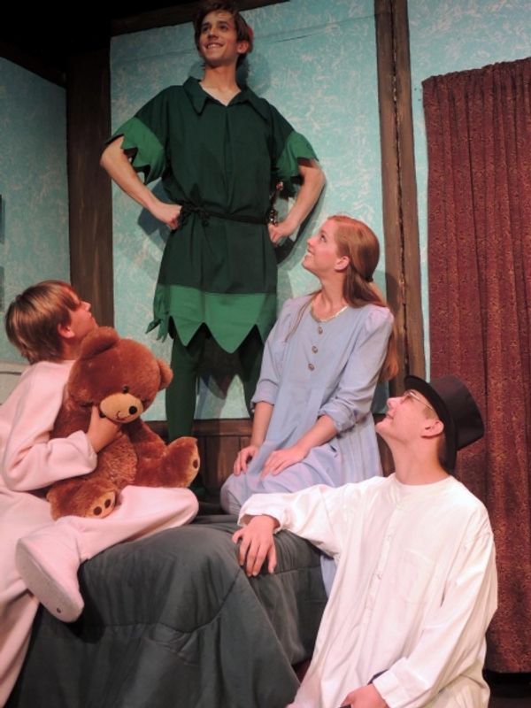 Joseph Waeyaert as Peter Pan, Mary Ellen Cameron as Wendy, Sam Buchanan as John, and  Photo