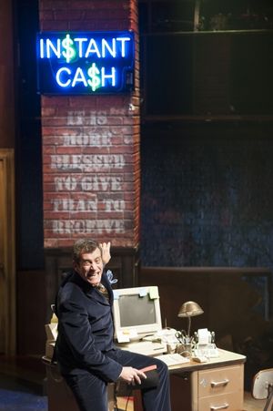 Mr. Peachum (Bobby Smith) discusses the complications in ''arousing human pity'' Photo