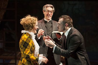 Reverend Kimball (Thomas Adrian Simpson, center) oversees the marriage of Polly Peach Photo