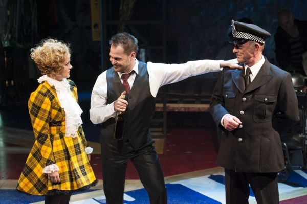 Macheath (Mitchell Jarvis, center) introduces Polly Peachum (Erin Driscoll) to Tiger  Photo