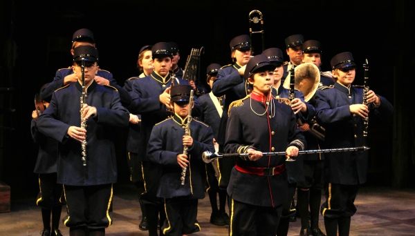The boys band, led by drum major Andy (Christian Bardin) rehearse for the Loyalty Day Photo