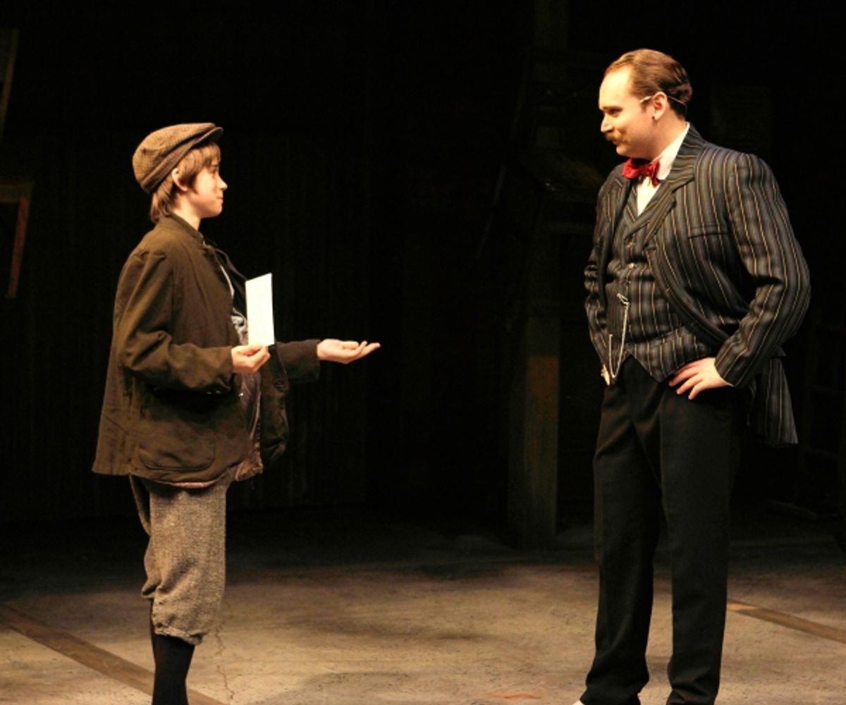 A messenger boy (Raphael Ruggero) holds out for a tip from A. W. Warnock (Randy Schmeling) at 