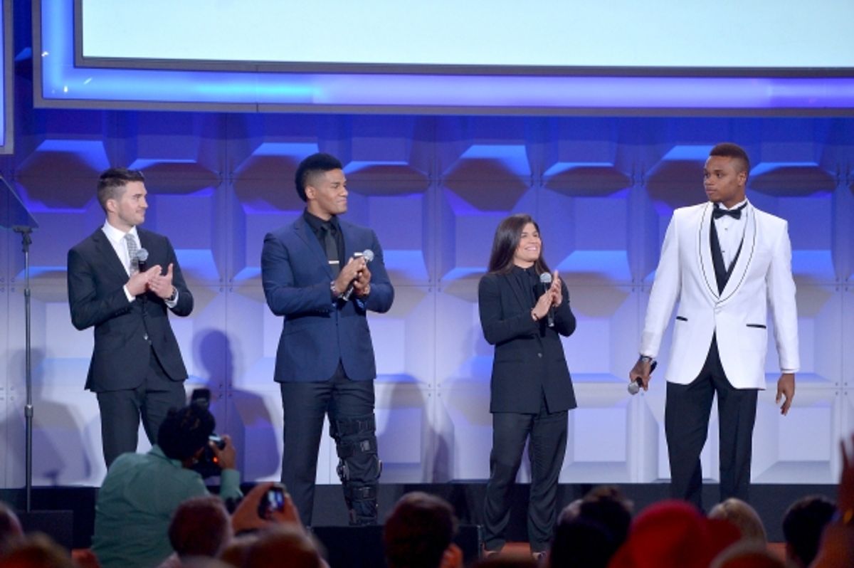 NEW YORK, NY - MAY 03:  Blake Skjellerup, Darren Young, Jessica Aguilar and Derrick Gordon attend the 25th Annual GLAAD Media Awards on May 3, 2014 in New York City.  (Photo by Stephen Lovekin/Getty Images for GLAAD) at 