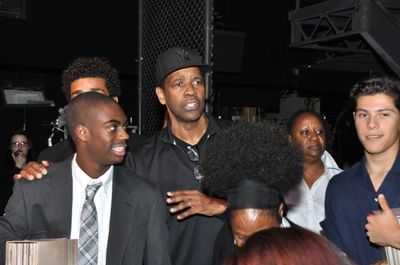 Denzel Washington surprised the contestants with a visit Photo