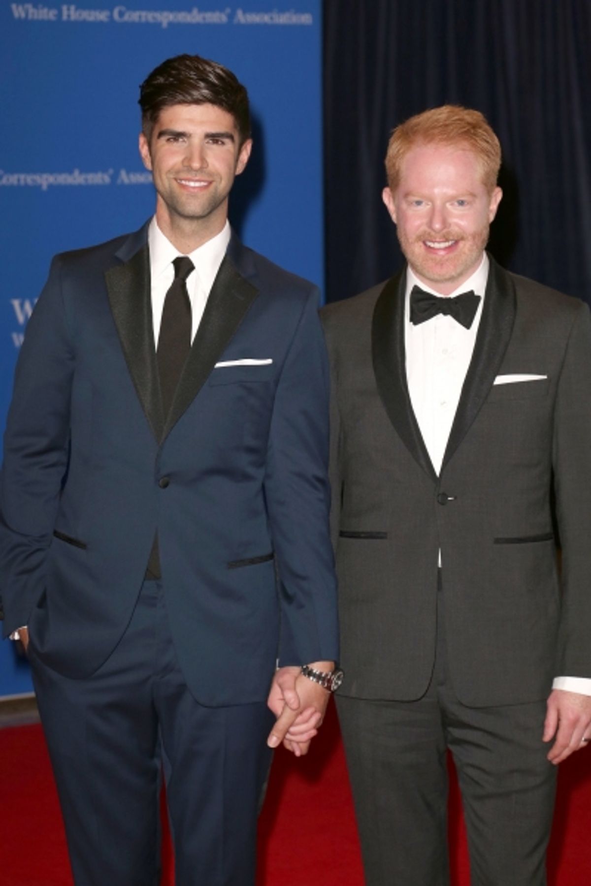 Justin Mikita and Jesse Tyler Ferguson at 