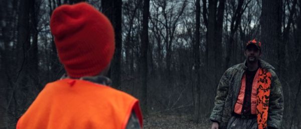 Shawn Feehly and Zachary Wanous, father and son confront each other in the woods Photo